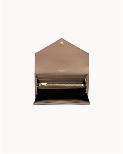 CASSANDRE MATELASSÉ large flap wallet in 